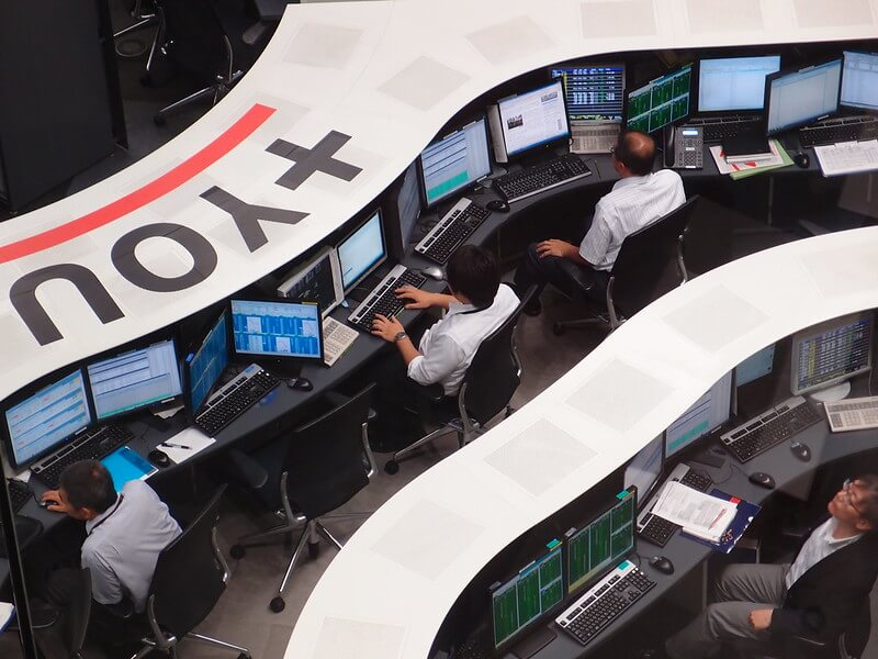 Traders at the Tokyo Stock Exchange